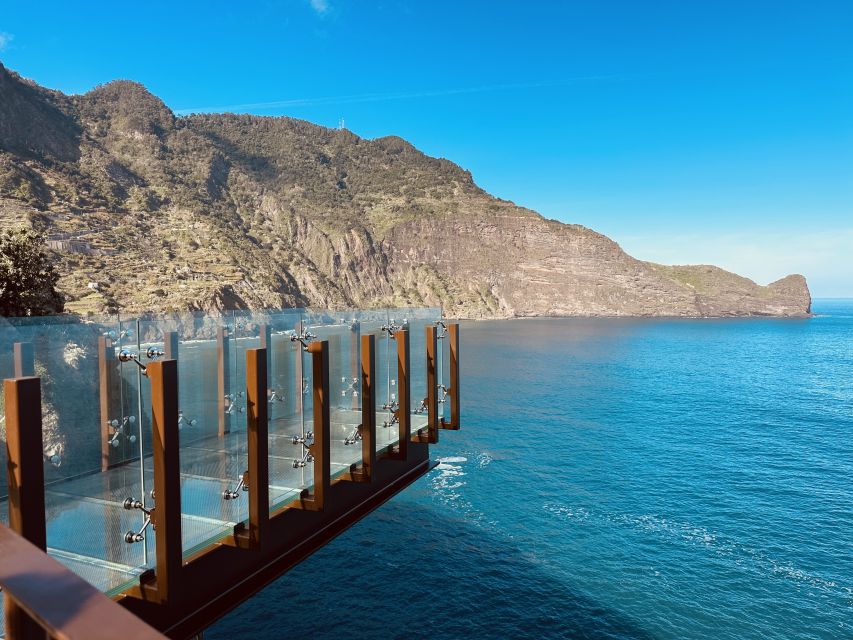 Funchal: East Madeira Island Guided Tour & Laurissilva Walk - Santana village time and the triangular thatched houses