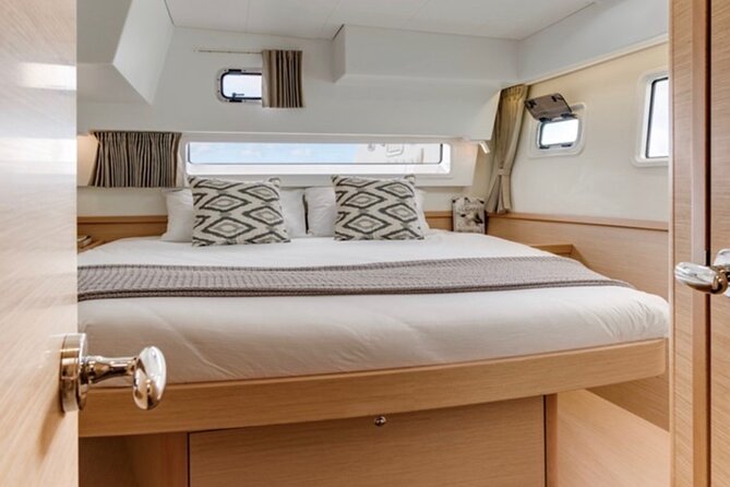 Half Day Tour on a Luxury Catamaran on Madeira Island - Returning Along the Coast to Funchal: Views, Motion, and Photo Time